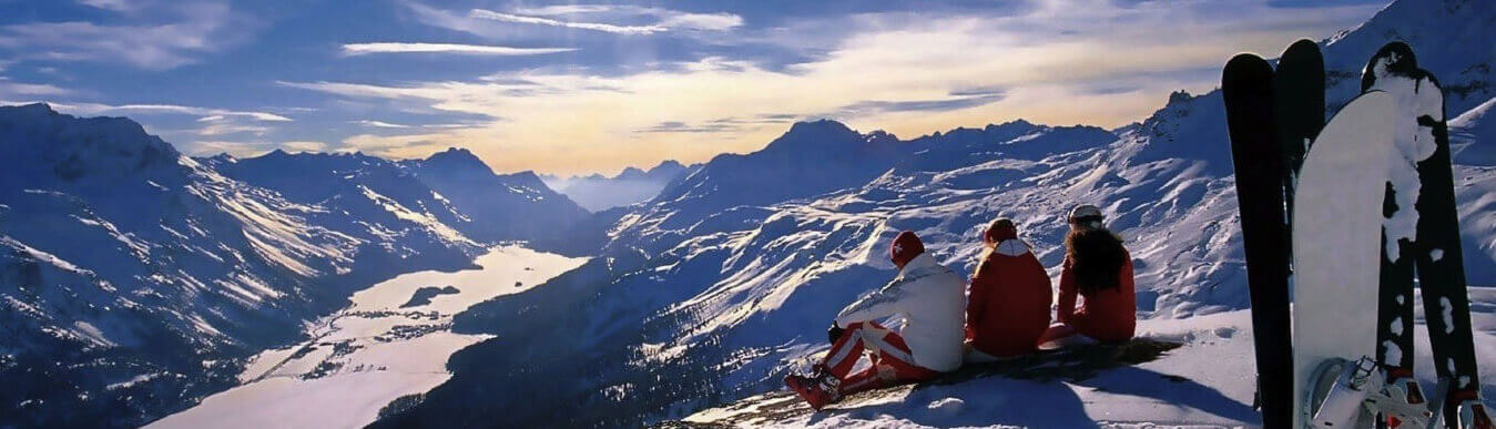 Skier's Overlooking Mountains